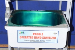 PADDLE OPERATED HAND SANITIZER